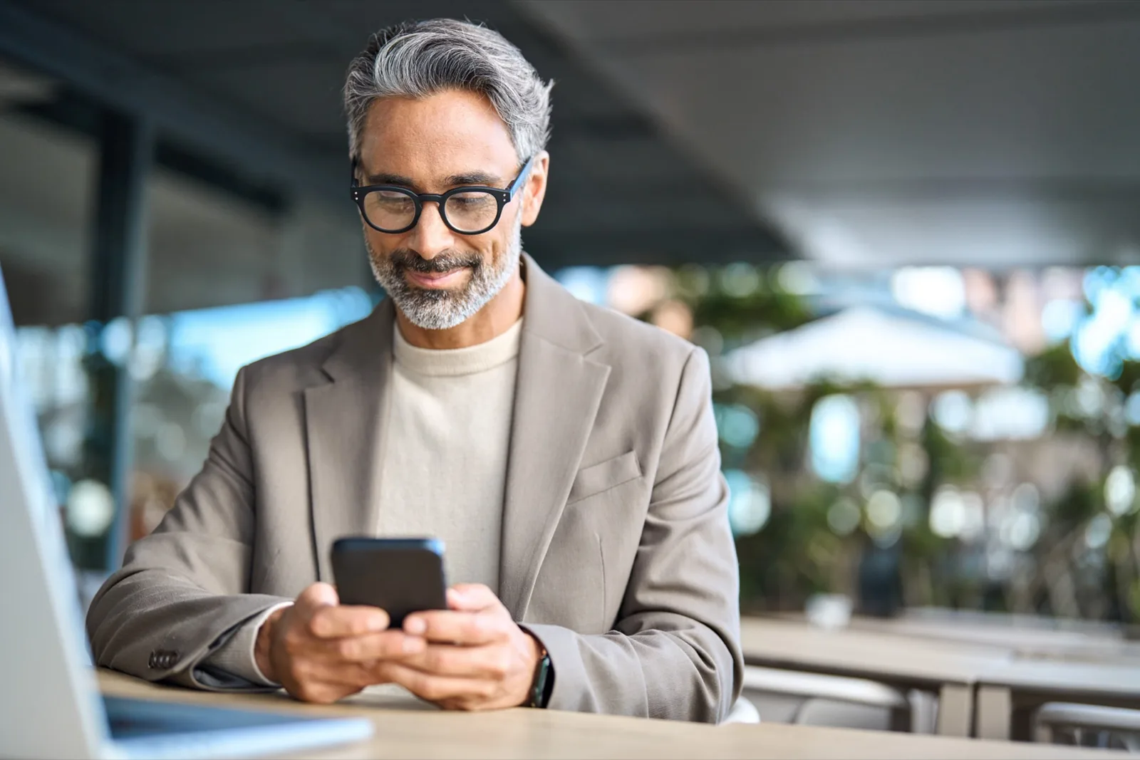 Investor reviewing portfolio on phone
